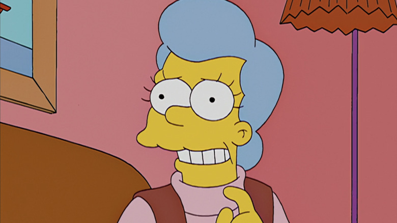 Mona looking anxious