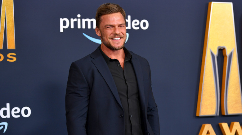 Alan Ritchson at 57th Academy of Country Music Awards in March 2022