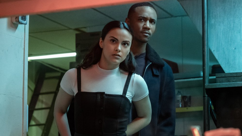Jessie Usher and Camilla Mendes in Dangerous Lies