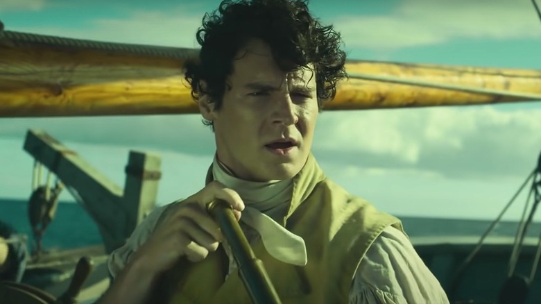 Captain George Pollard Jr holding a telescope