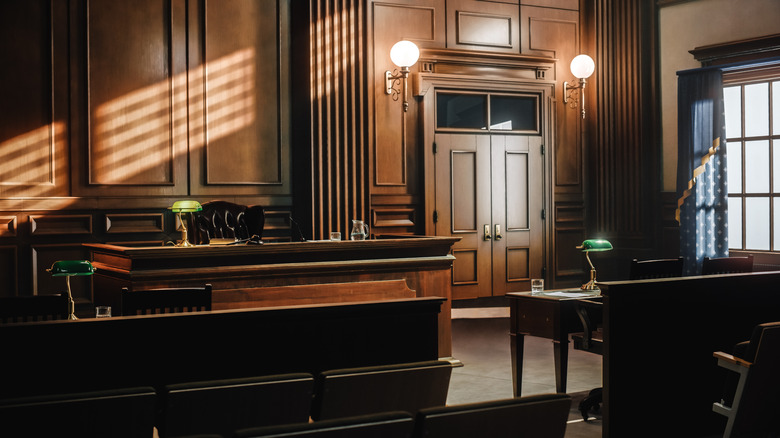 Empty courtroom with lights illuminated