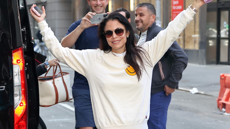 Bethenny Frankel with arms outstretched