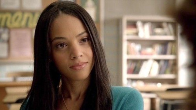 Maya St. Germain smiling in class in "Pretty Little Liars"