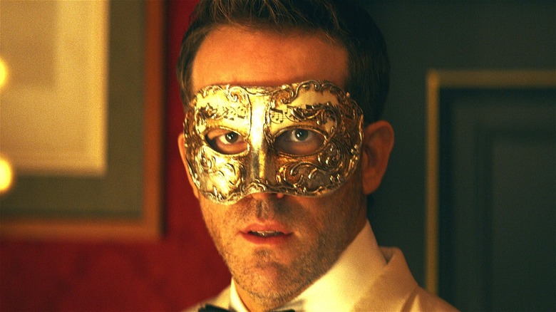 Nolan Booth in masquerade mask