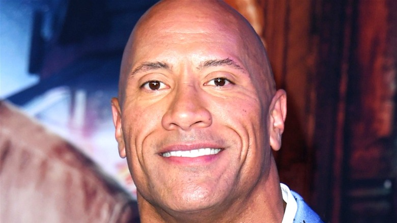 Dwayne Johnson posing for photo