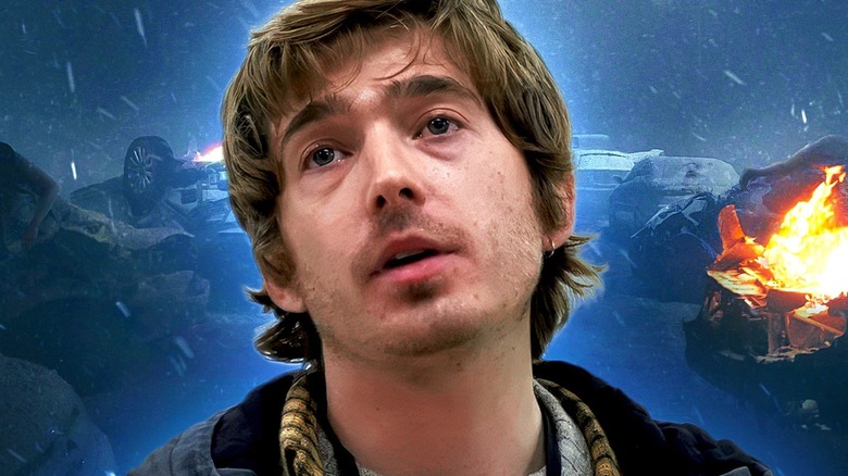 Bryan against a backdrop of Raccoon City from 