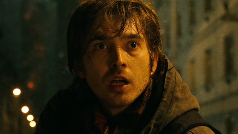 Bryan looking scared outside in Resident Evil (2026)