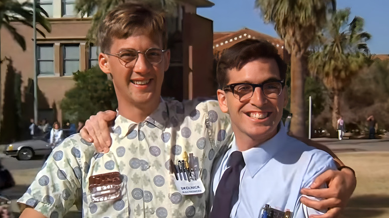 Gilbert and Lewis with arms around each other