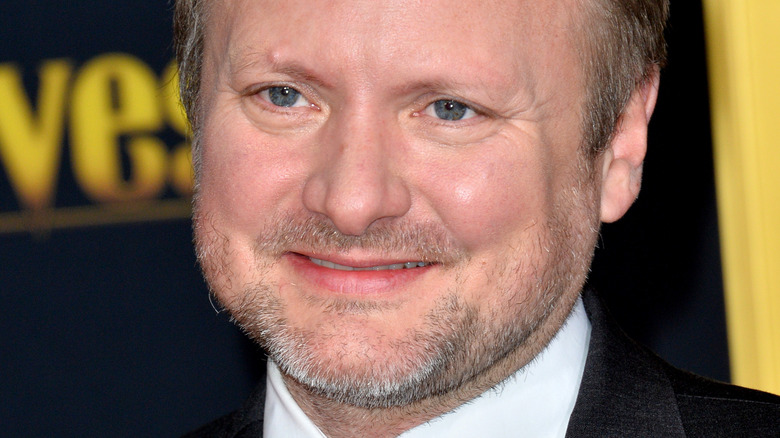 Rian Johnson smiles