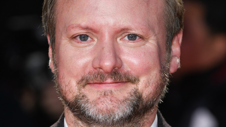 Rian Johnson smiles in close-up