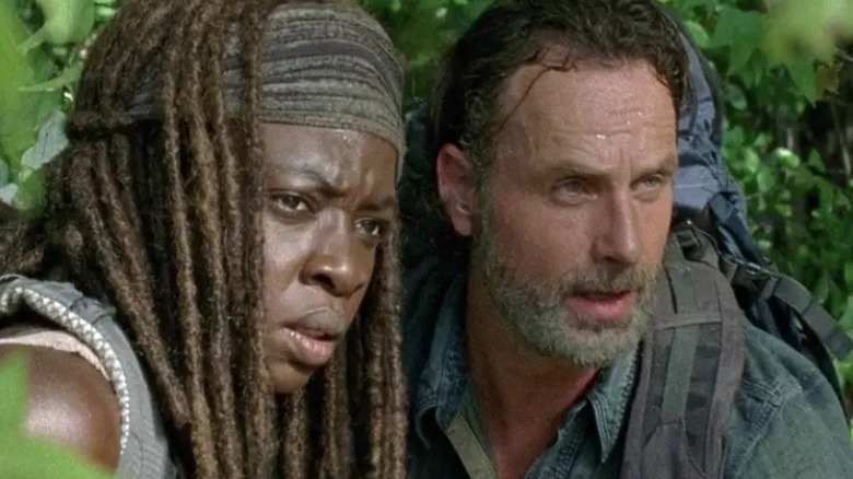 Rick and Michonne hiding