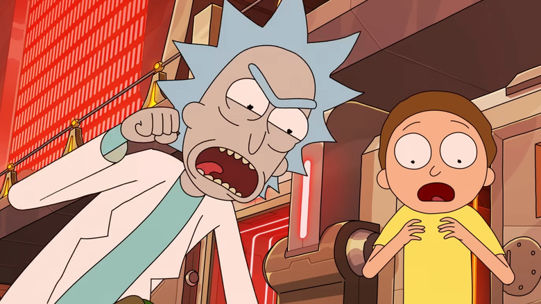 Rick punching and Morty shocked expresion