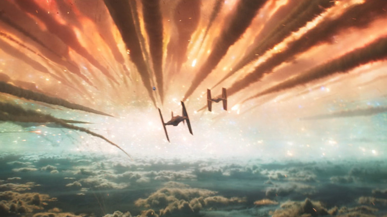 Two TIE fighters navigate a meteor shower on Star Wars Andor
