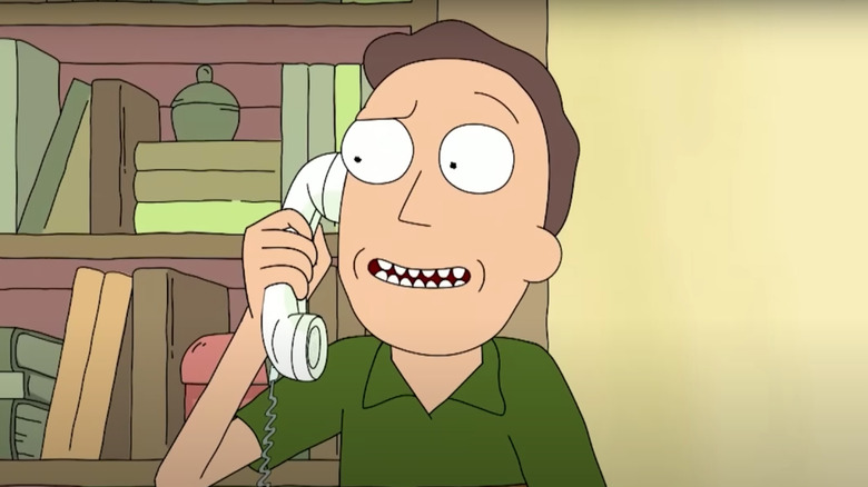 Jerry grins on phone