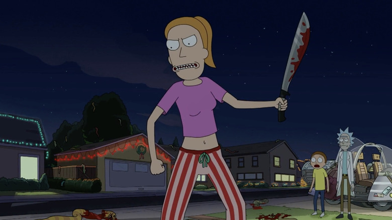 Summer Smith holding a bloody machete