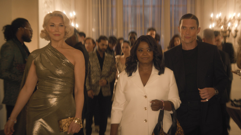 Judith, Debbie, and Billy walking through a party in "Ride or Die"