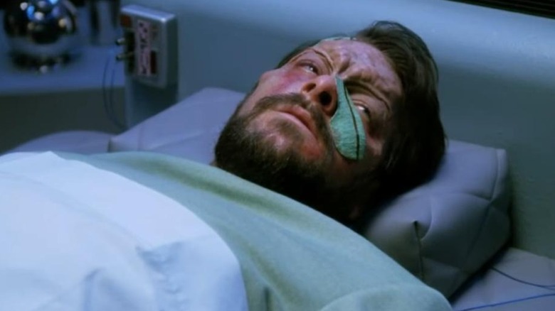 Riker bruised and lying on a bed in Star Trek: The Next Generation (1987)