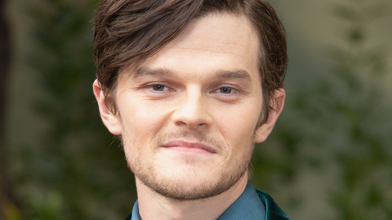 Robert Aramayo posing for the press