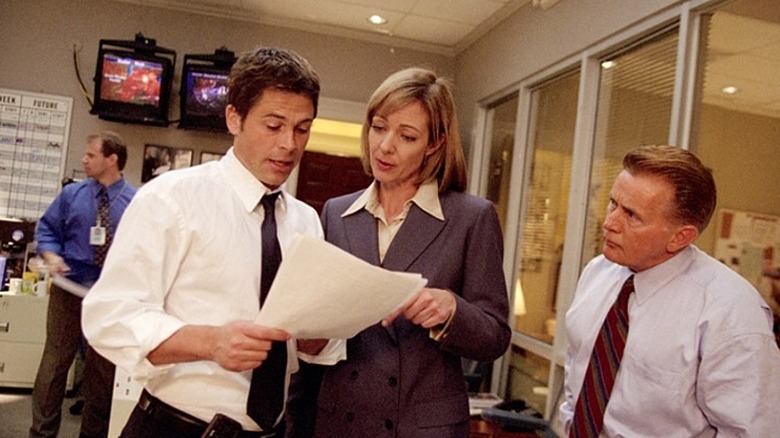 Rob Lowe and Allison Janney read papers in The West Wing