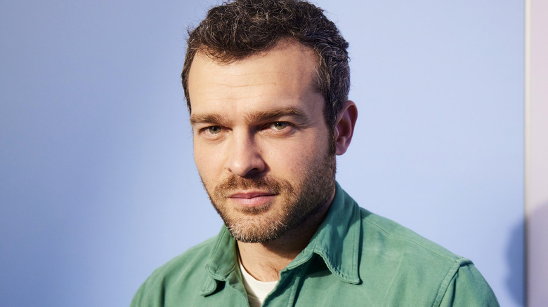 Alden Ehrenreich posing