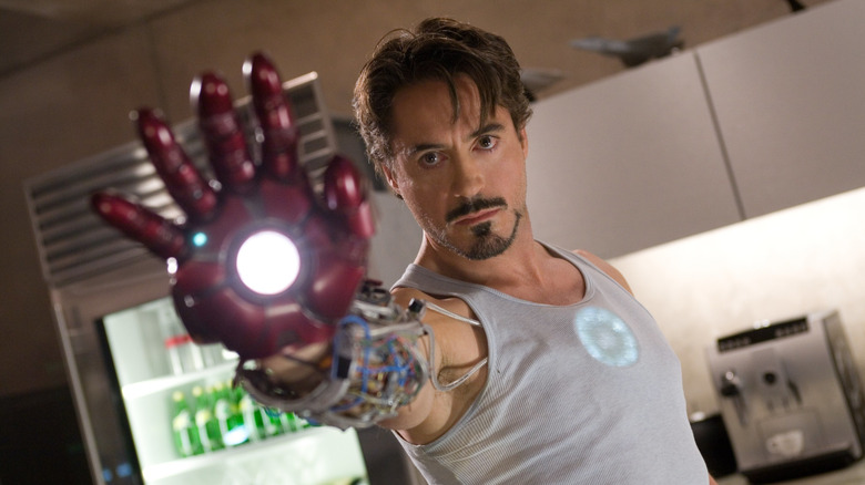 Tony Stark with iron man hand