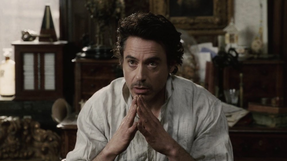 Robert Downey Jr as Sherlock Holmes