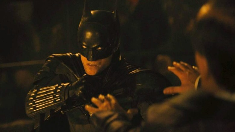 Batman fighting Penguin