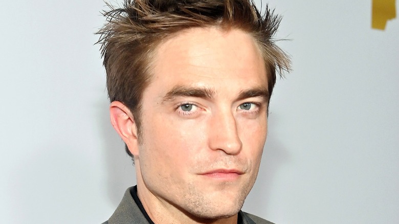 Robert Pattinson looking at the camera