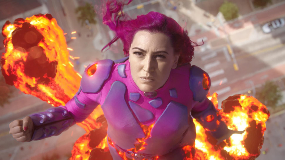 Taylor Dooley as Lavagirl launching into fiery action