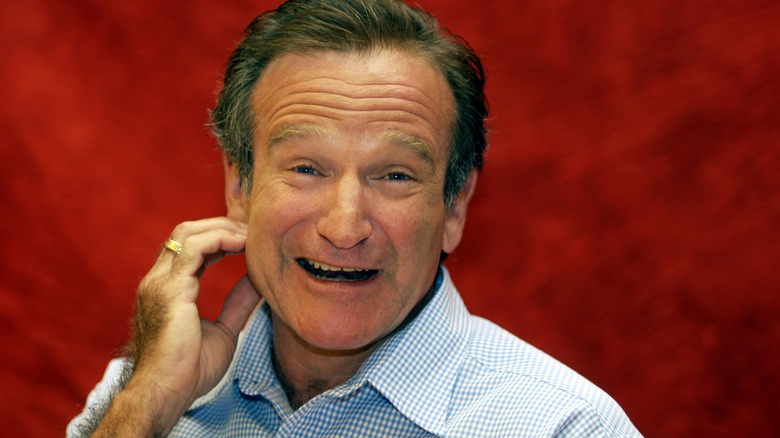 Robin Williams smiles in studio portrait