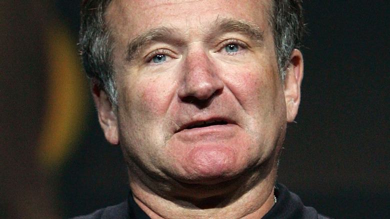 Robin WIlliams with arms crossed