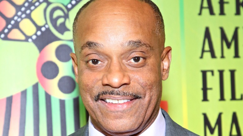 Rocky Carroll Face Green Background