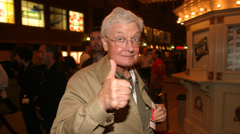 Roger Ebert smiling and giving the thumbs-up gesture