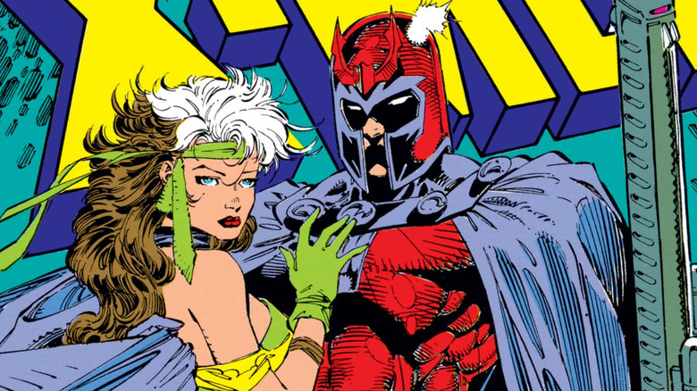 Rogue standing close to Magneto, hand on his chest
