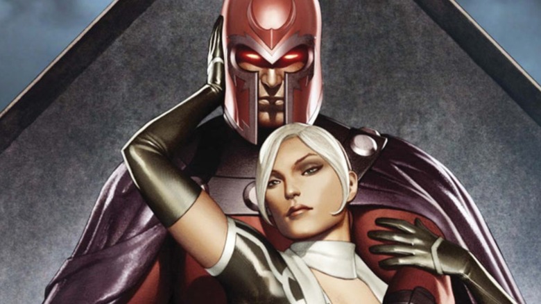 Magneto and Rogue standing with arms around each other