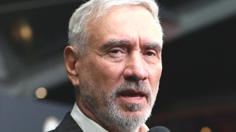 Roland Emmerich glares at the camera