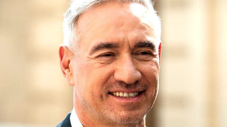 Roland Emmerich smiling