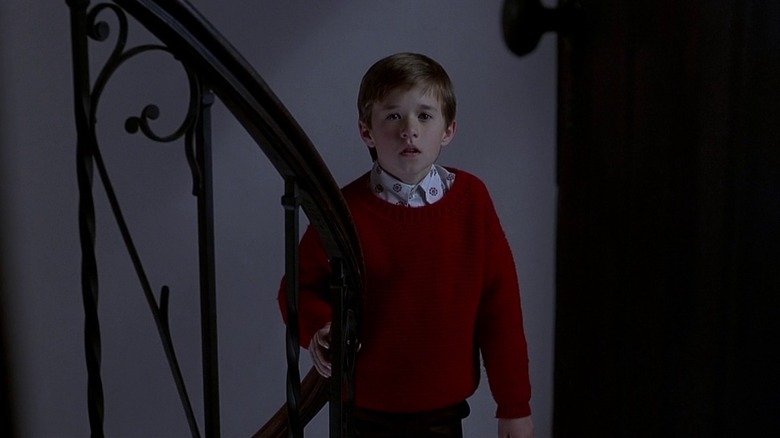 Cole wearing red sweater