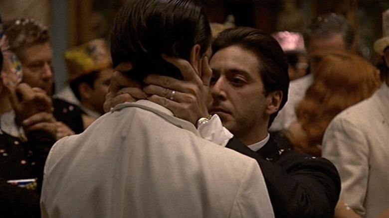 Michael giving the kiss of death