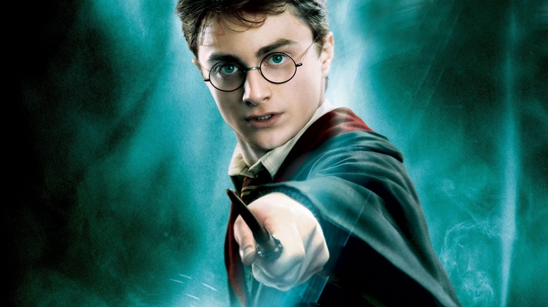 Harry Potter wielding wand