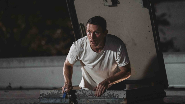 Jeff goes down a roof in "Roofman" (2025)