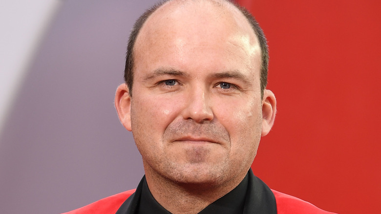 Rory Kinnear at Bond premiere in red suit