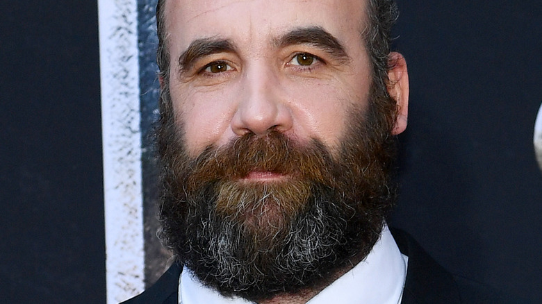 Rory McCann bearded posing at an event 