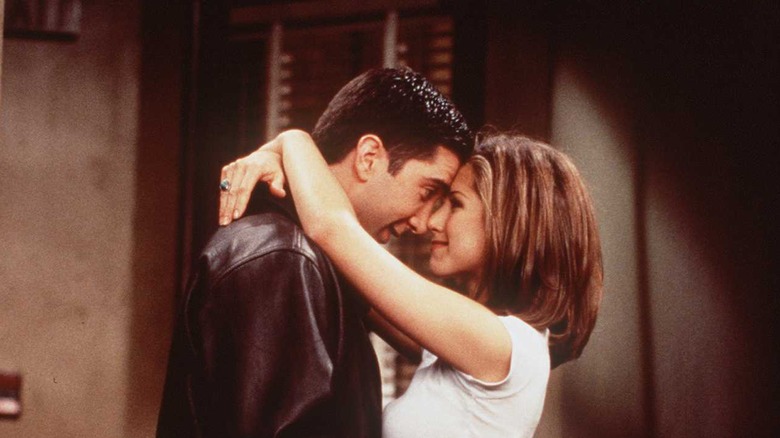 Rachel with arms around Ross