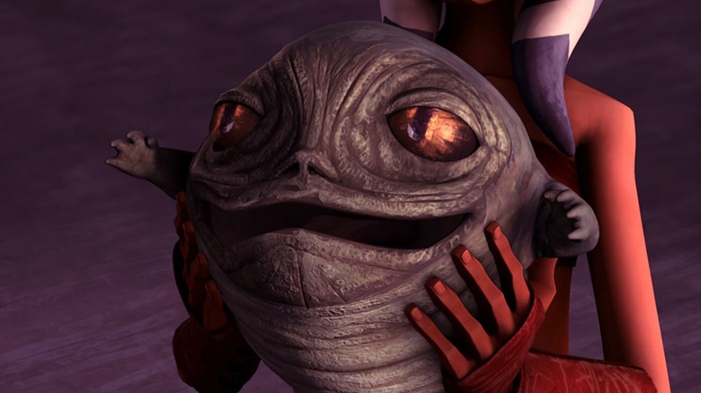 Rotta reaching out while being held by Ahsoka Tano in 