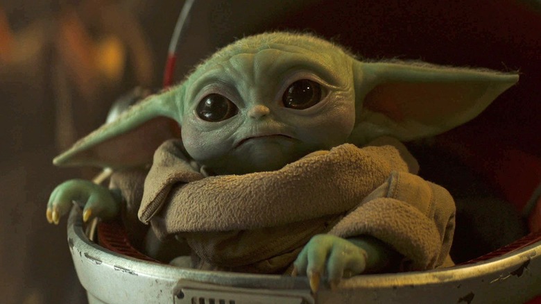 Baby Yoda looking concerned in his crib in "The Mandalorian" (2019)