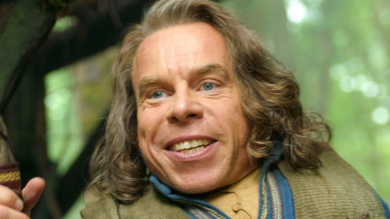 Warwick Davis in smiling in Willow