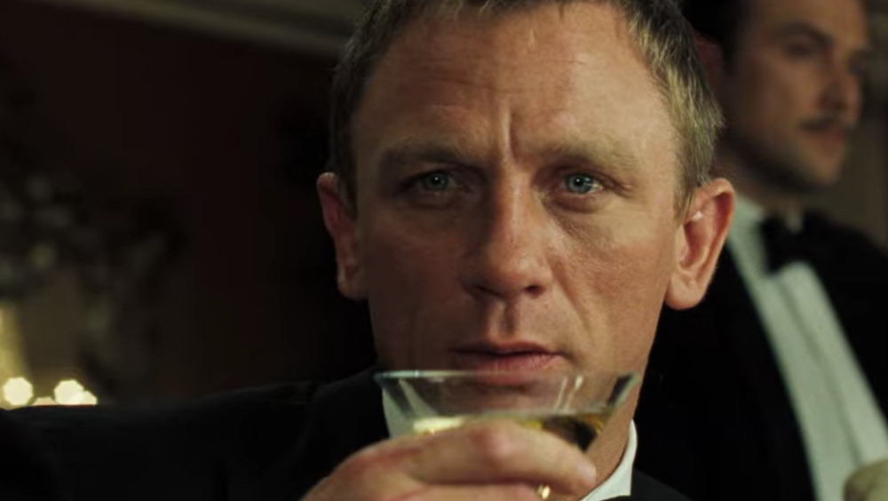 Daniel Craig sips drink