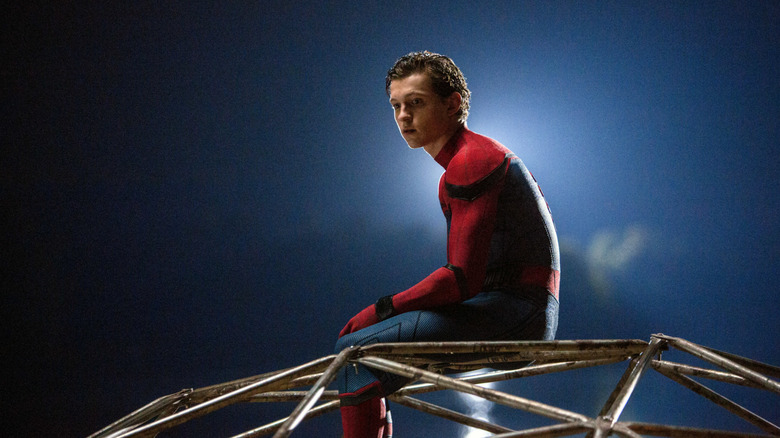 Spider-Man sitting in playground