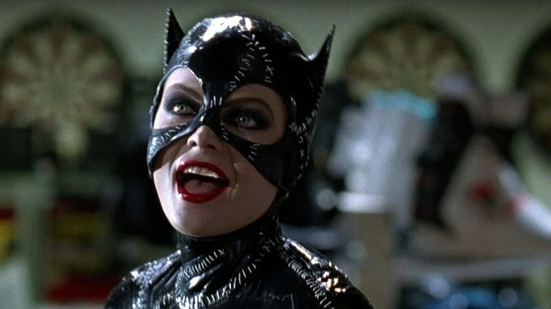 Catwoman lounging on the bed